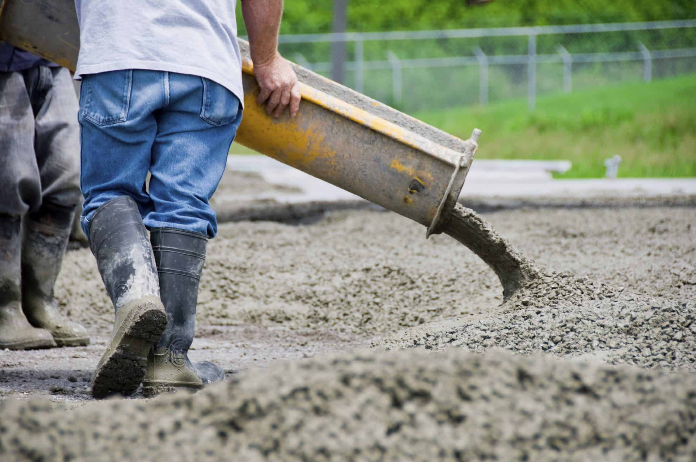 Pouring concrete for mud mat, (Photo of Mansueto Library co…